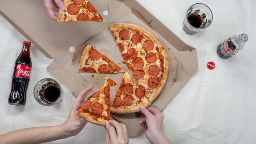 Los daños de comer pizza en exceso(PEXELS)