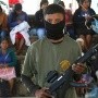 La impactante imagen de los niños que fueron armados para ayudar a combatir la delincuencia en México